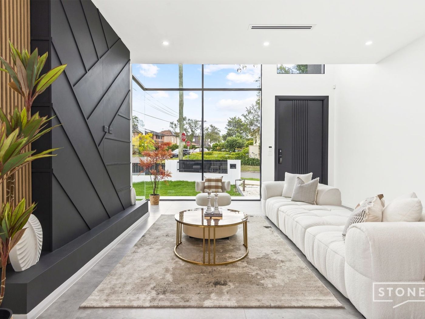 Living room with black feature wall